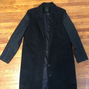 Black COS knee length coat with contrast sleeves